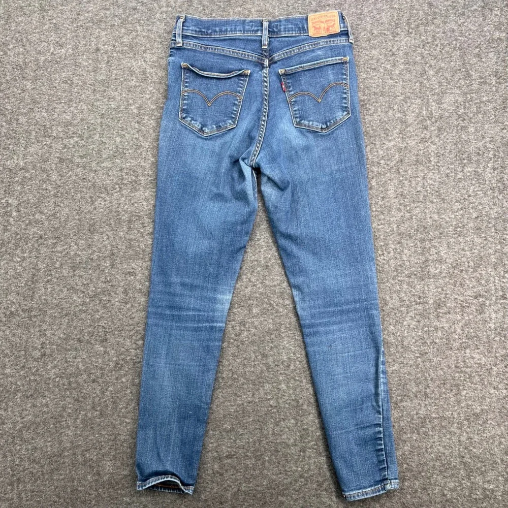 Levis 720 High Rise Super Skinny Jeans Womens 29 Medium Wash Blue Denim Pants